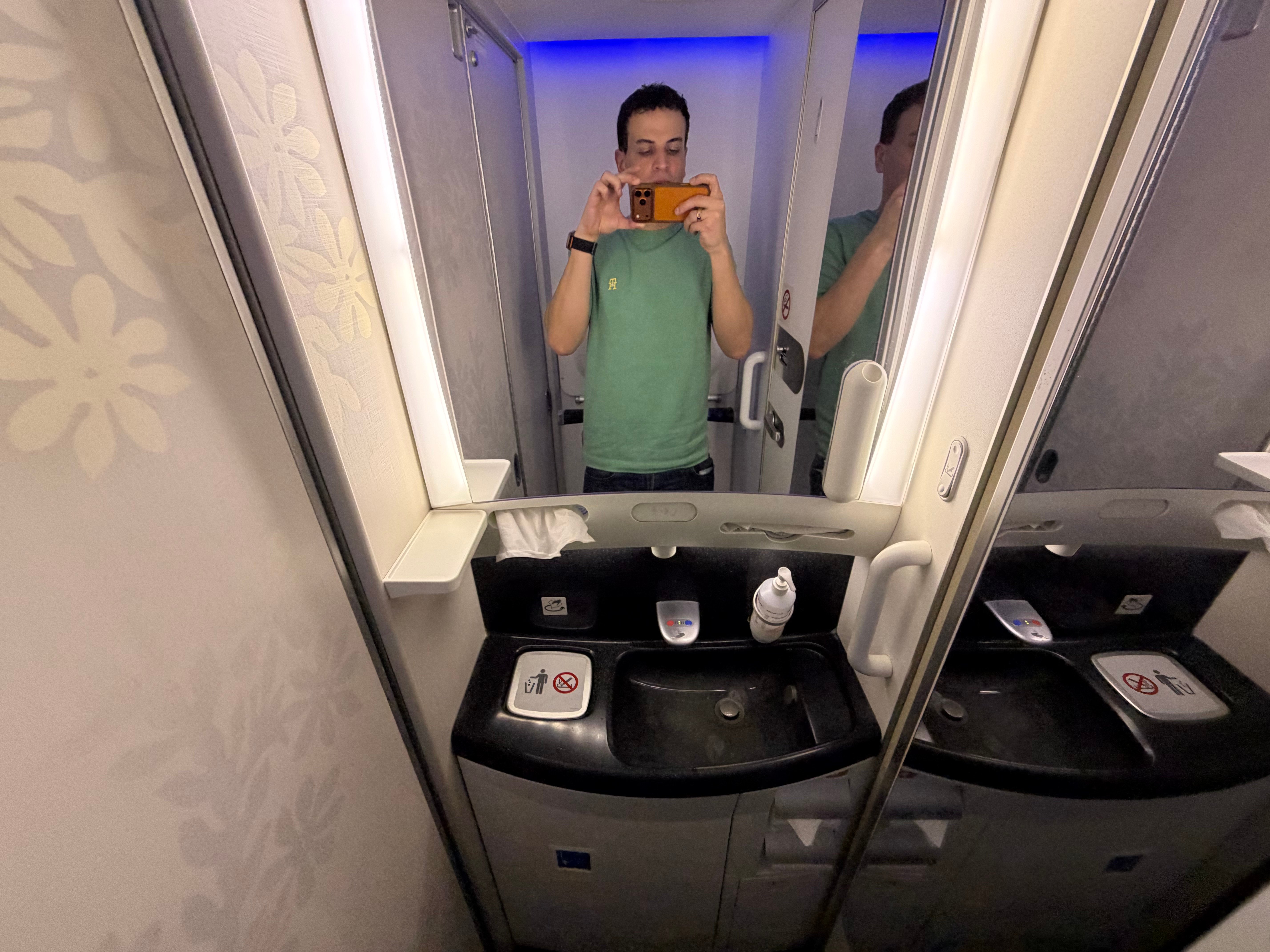 Mirror and sink inside an Air Tahiti Nui Boeing 787-9 lavatory.