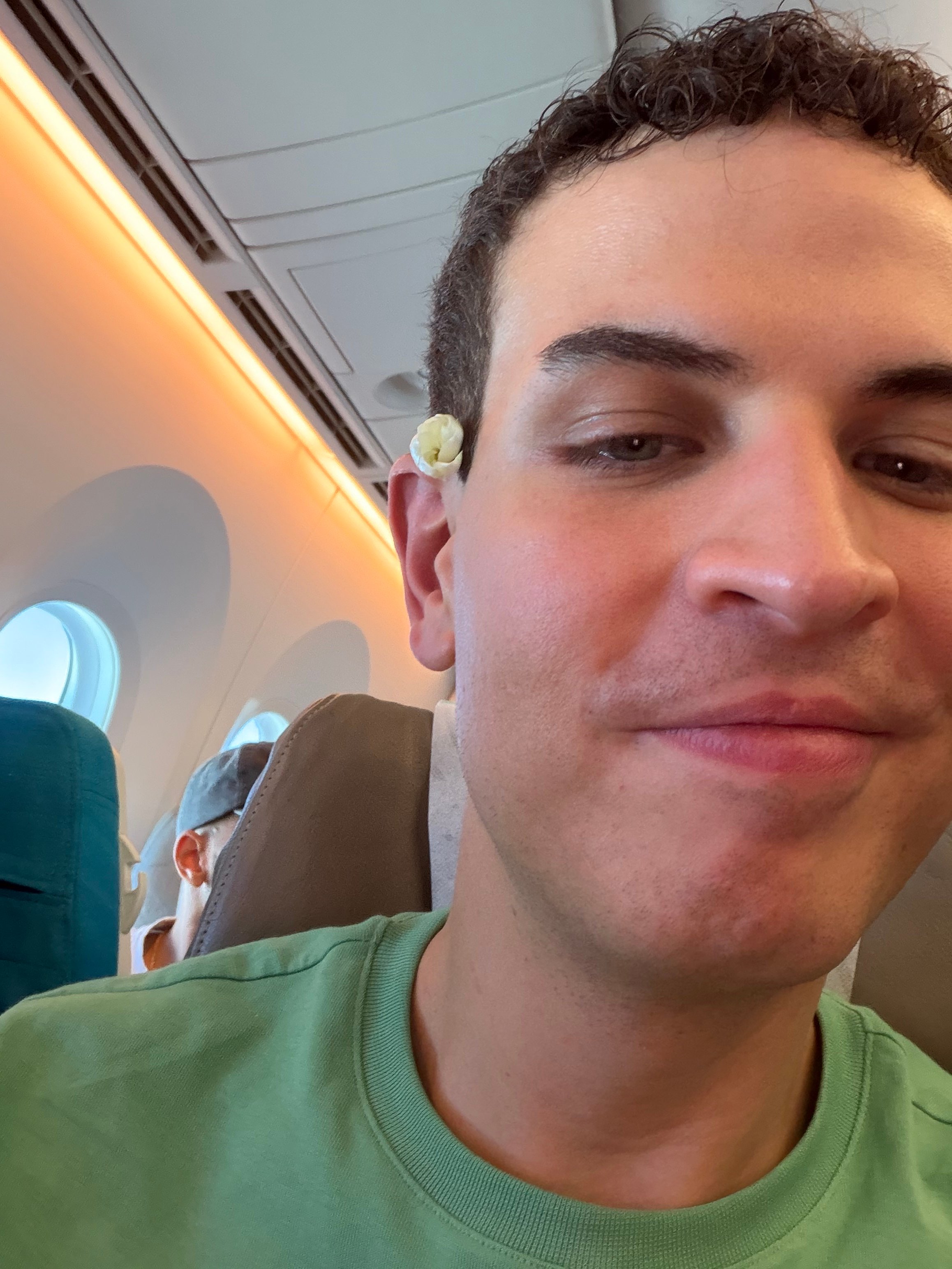 Germán wearing the fresh tiare flower provided by Air Tahiti Nui.