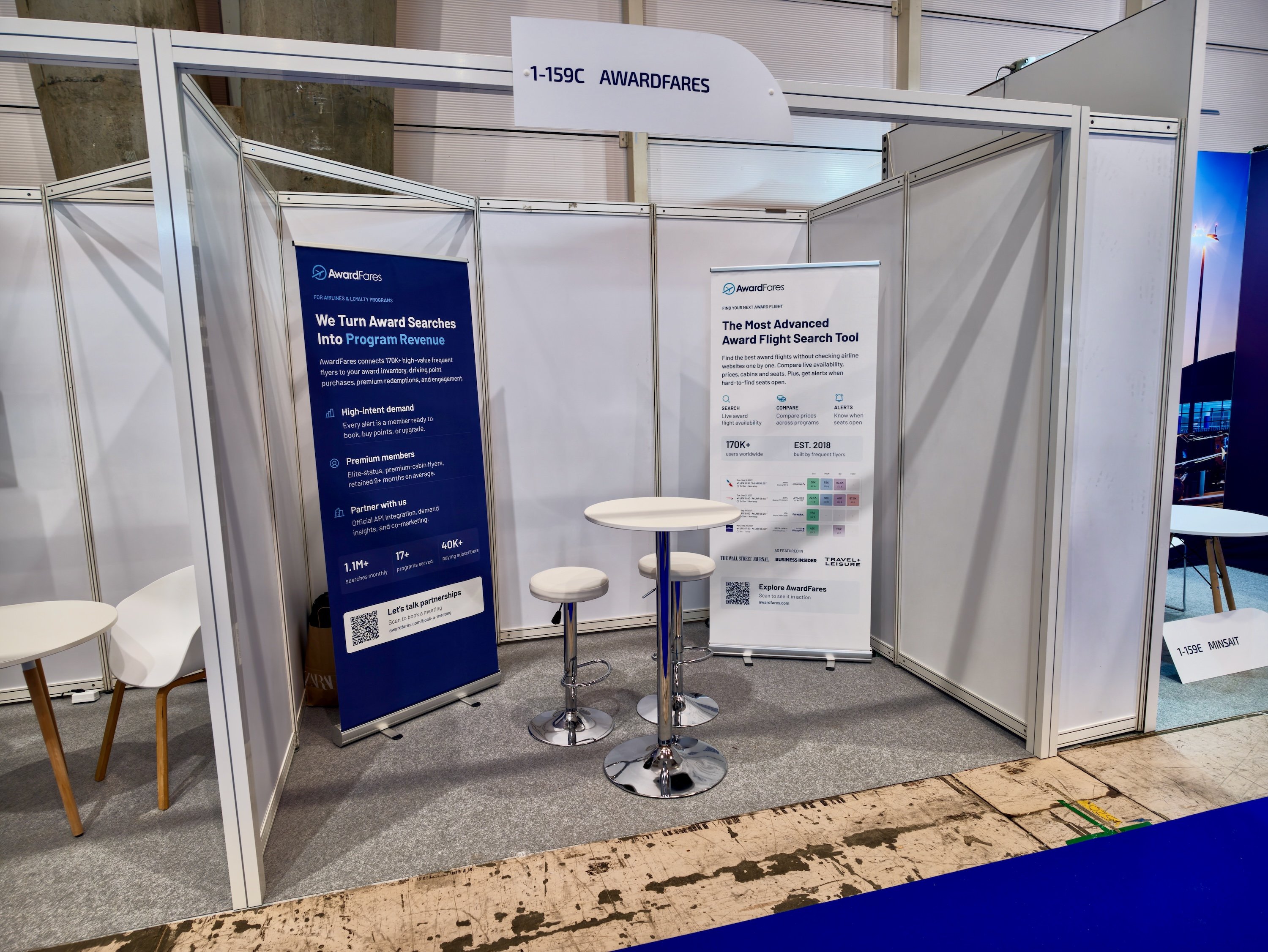 The AwardFares booth with banners showing our award search tools.