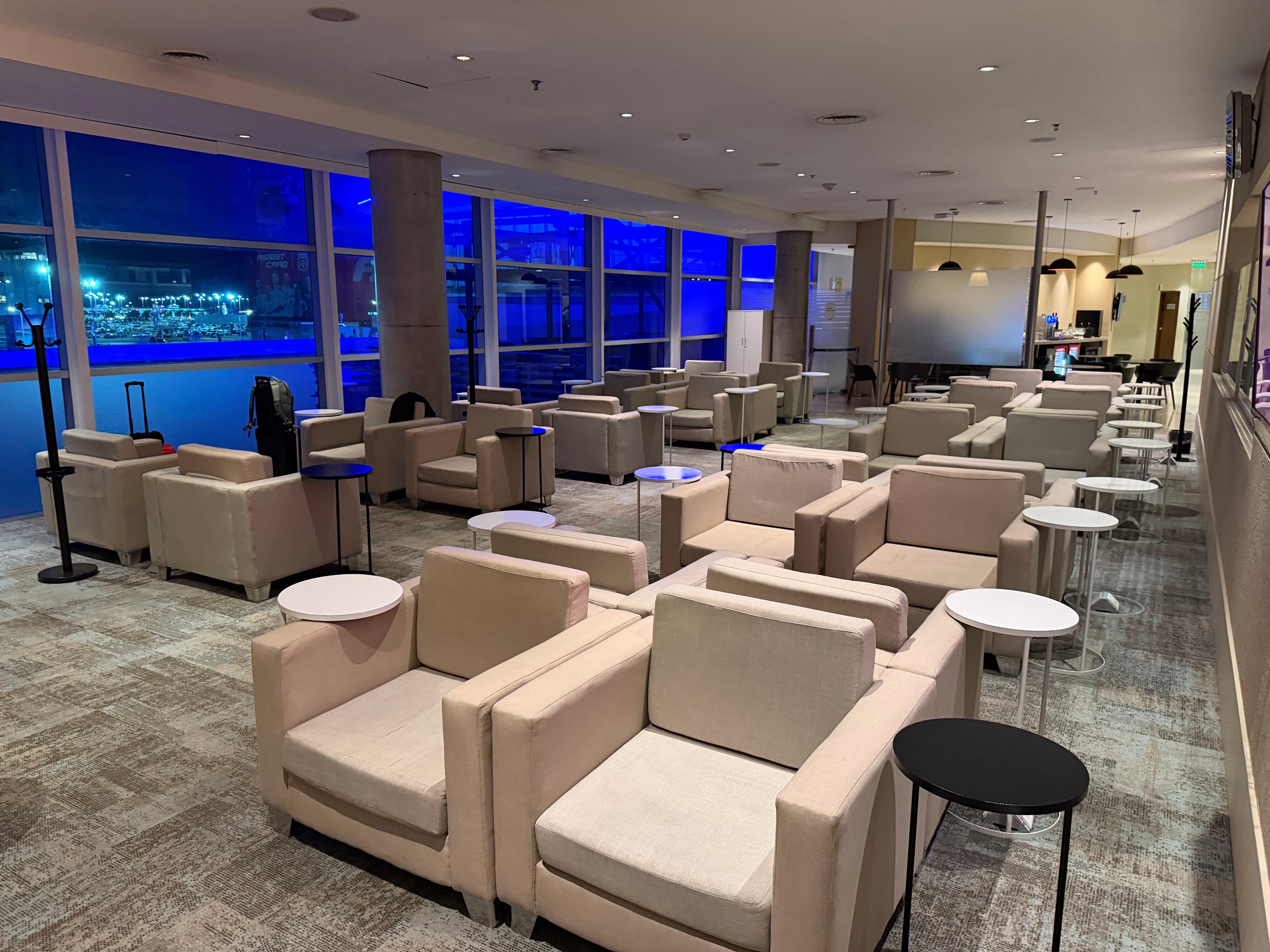 Window seating inside the Aerolíneas Argentinas Condor Lounge at Ezeiza.