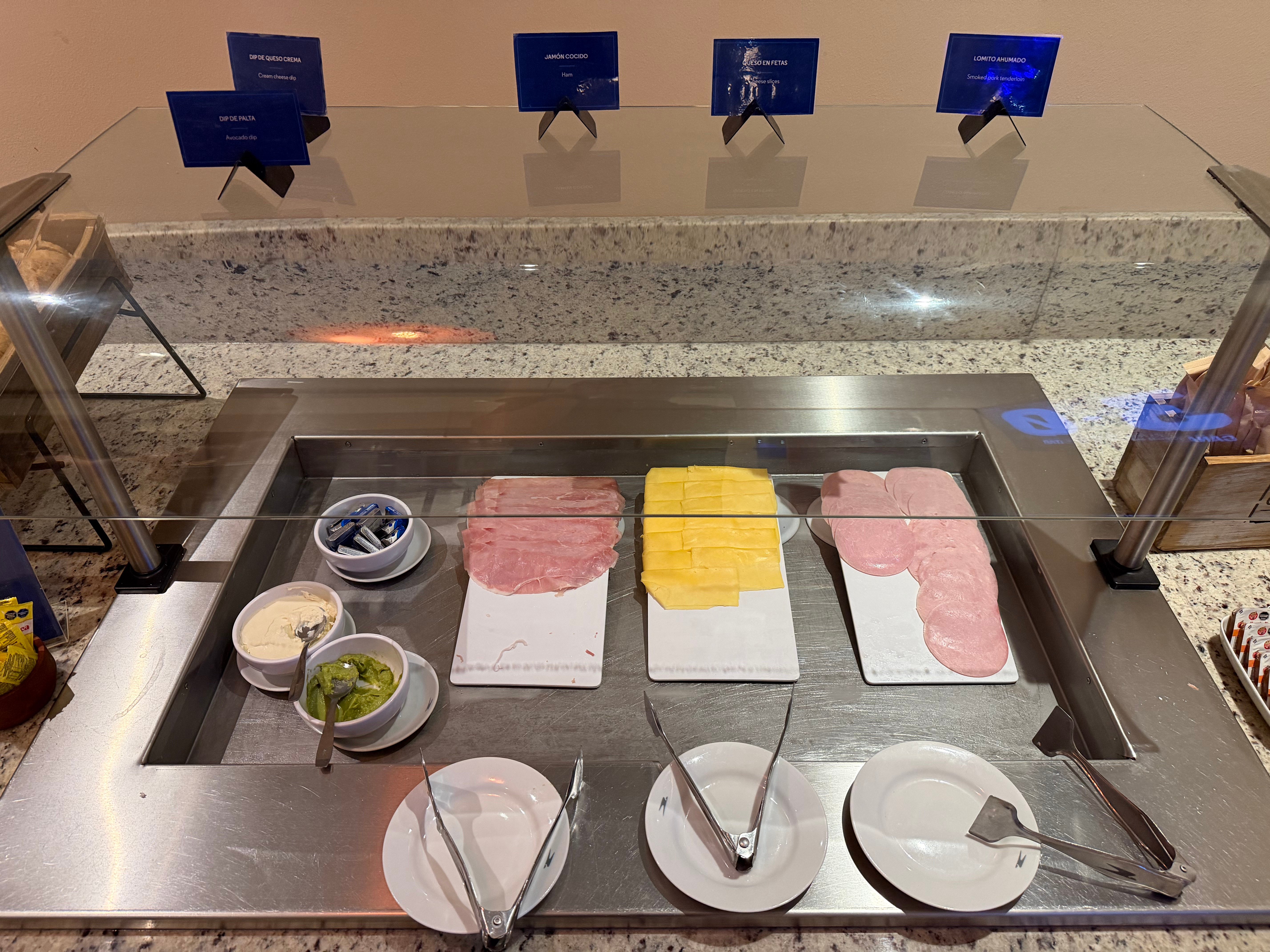 Cheese and cold cuts at the Aerolíneas Argentinas Condor Lounge.