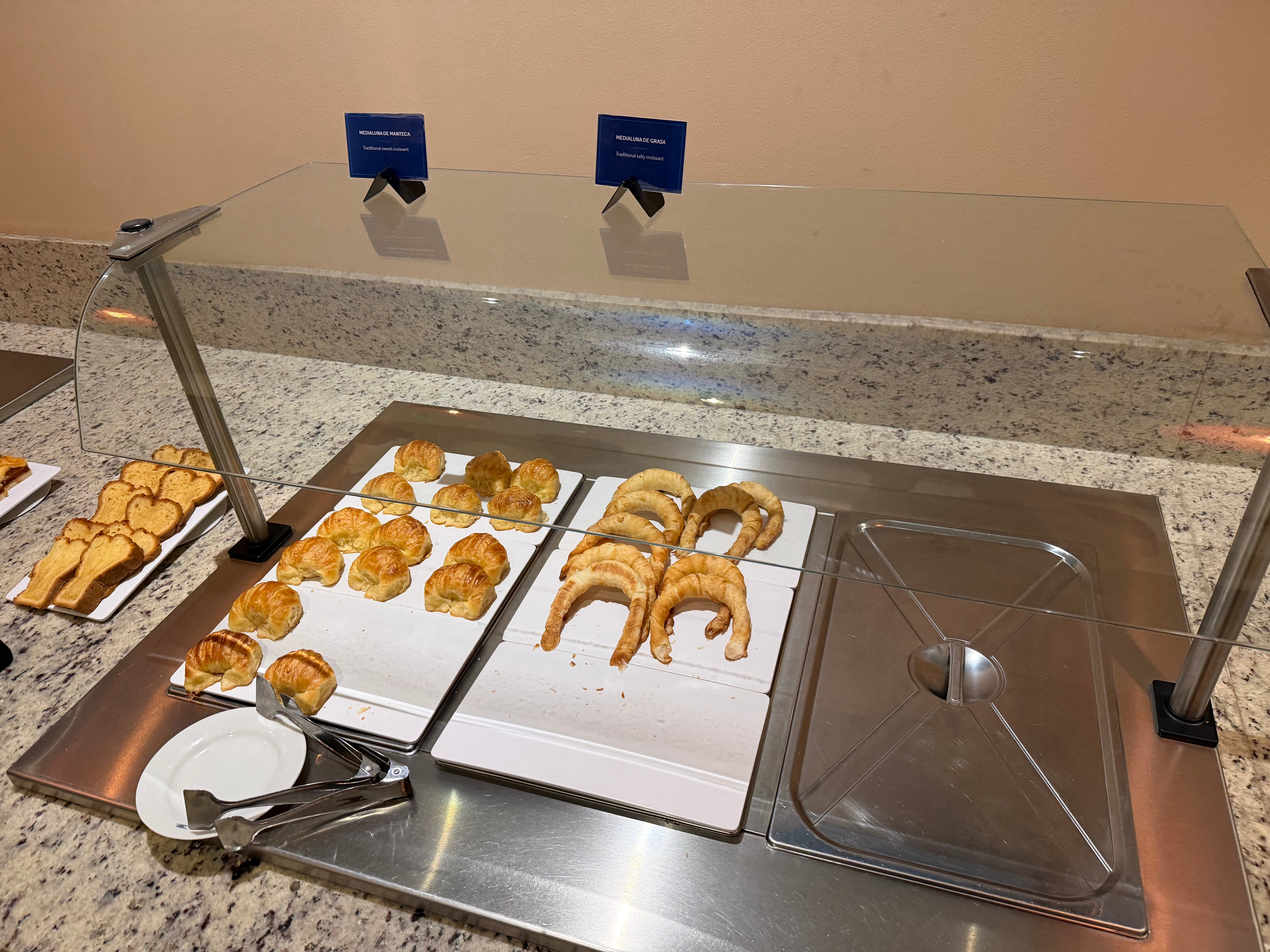Pastry selection at the Aerolíneas Argentinas Condor Lounge breakfast buffet.