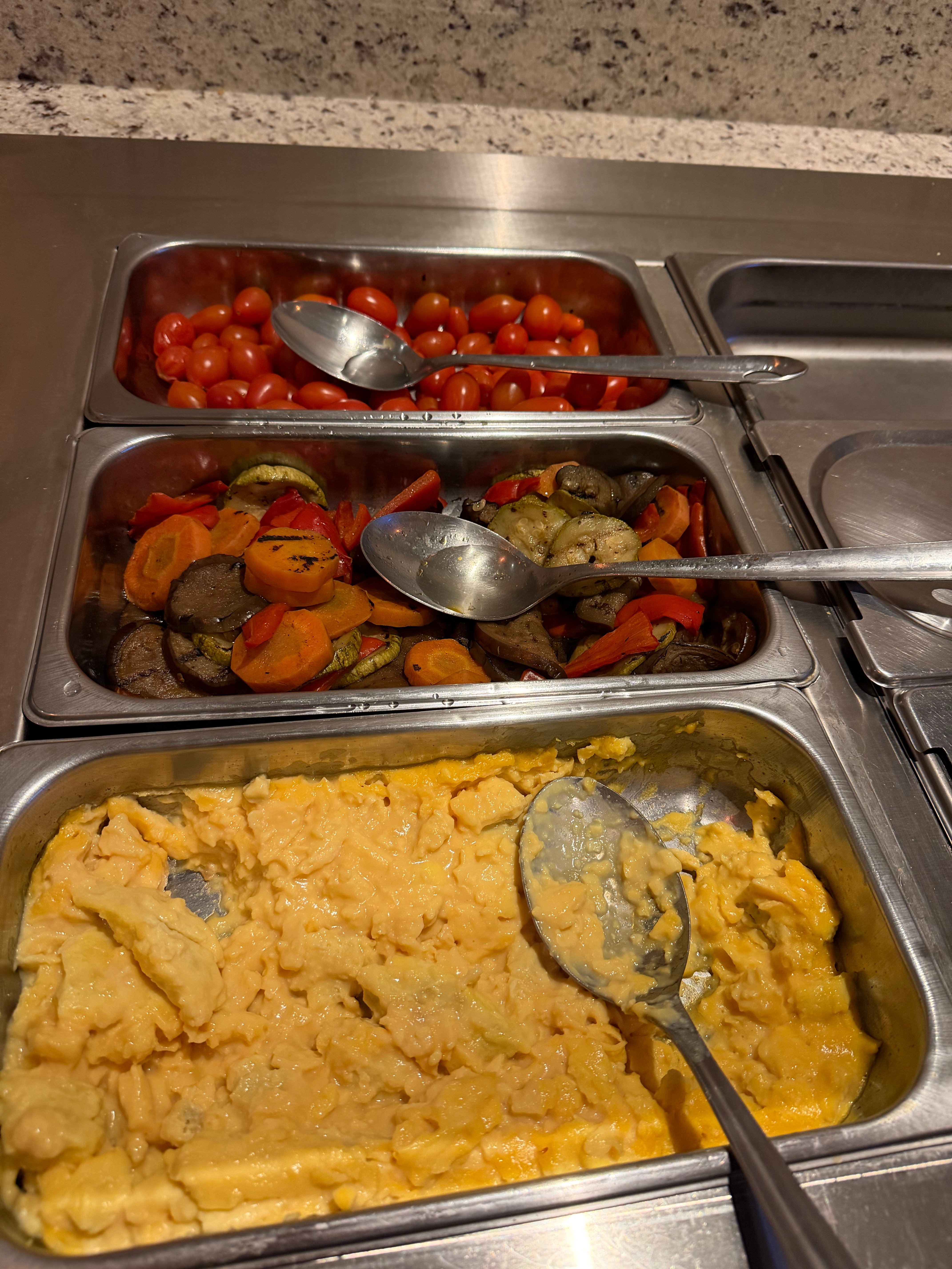 Scrambled eggs and vegetables at the Condor Lounge hot breakfast buffet.