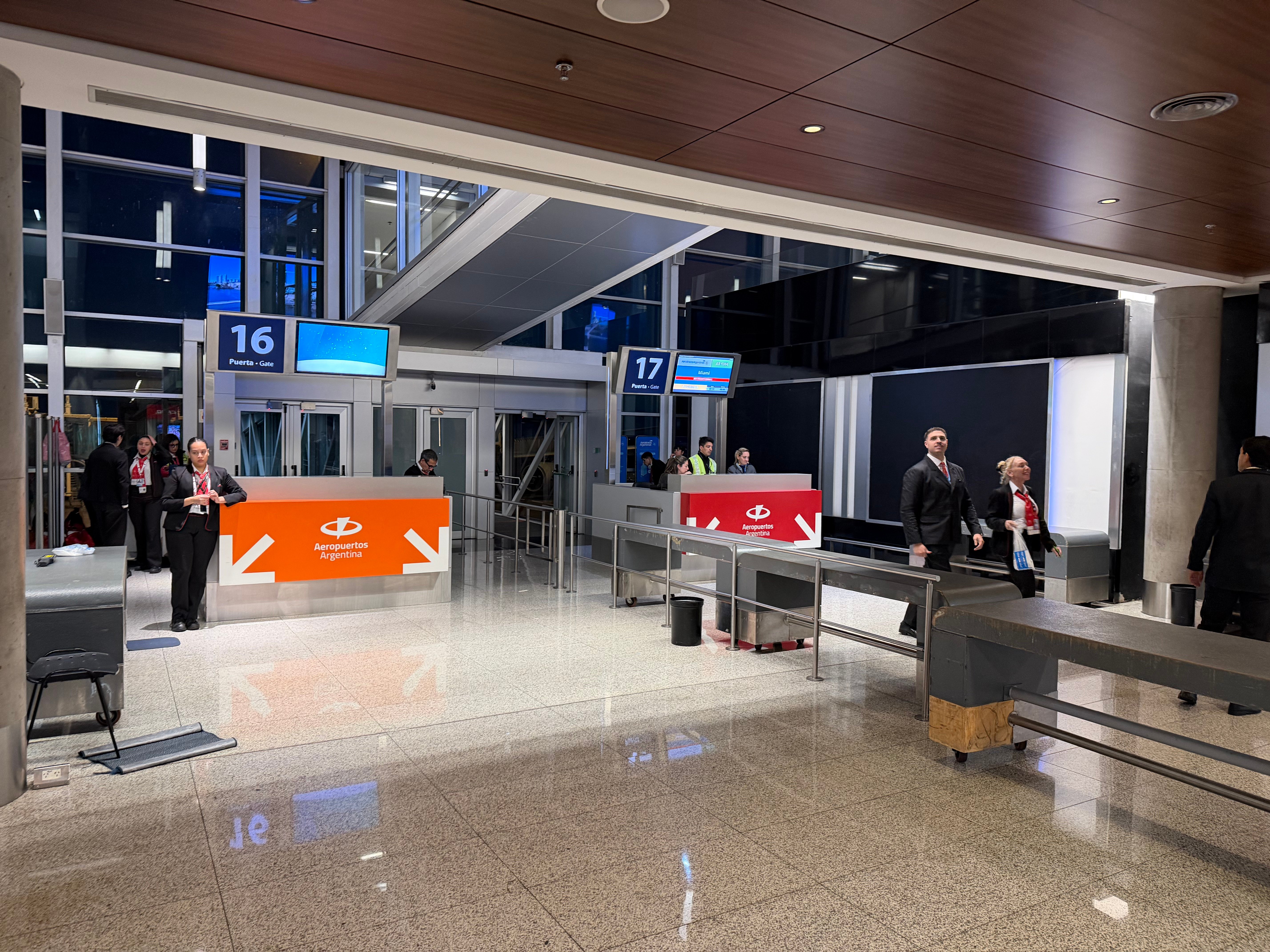 Additional security checkpoint beside the boarding gate for the flight to Miami.