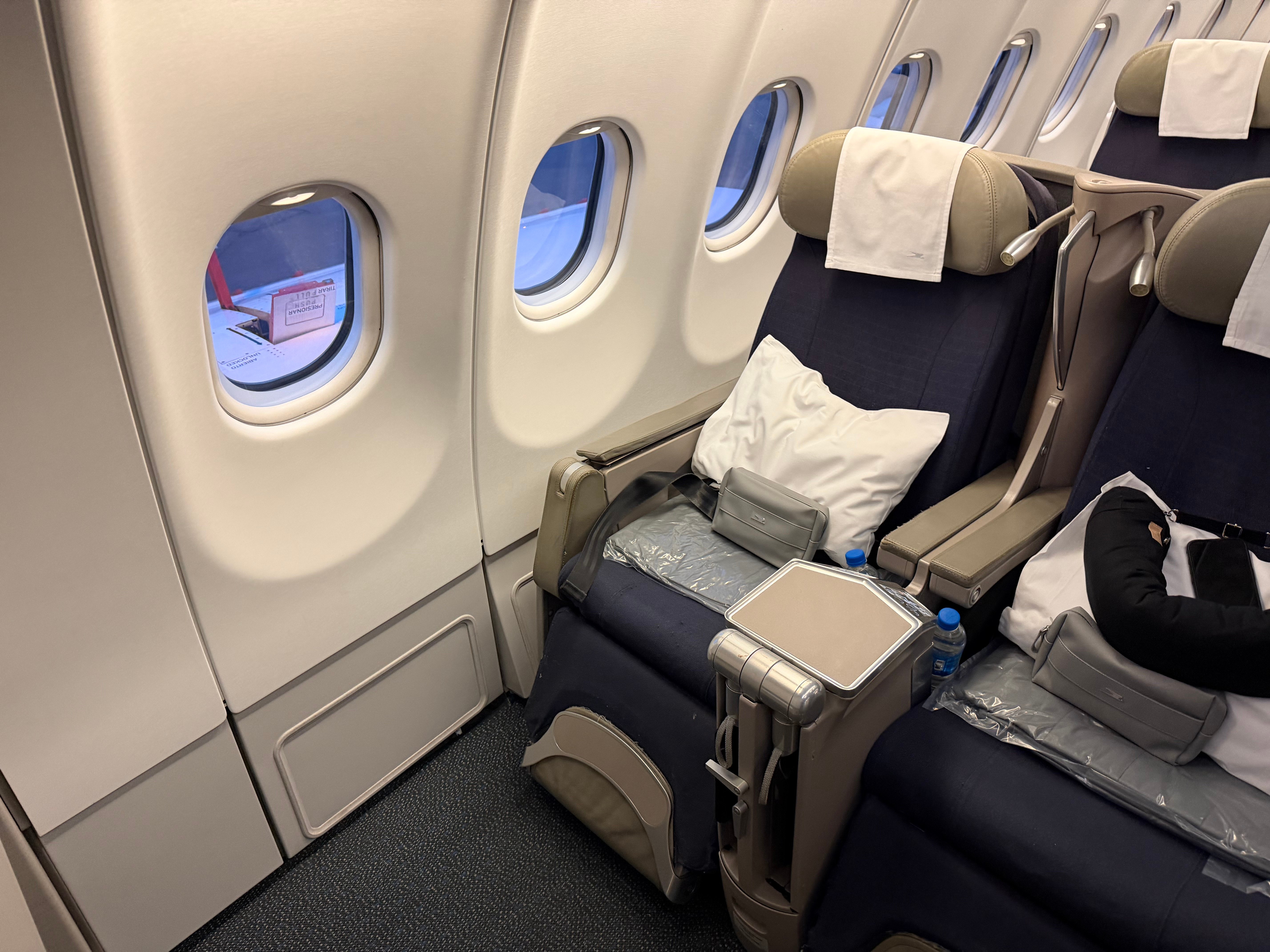 Paired window seats in the Aerolíneas Argentinas A330 Business Class cabin.