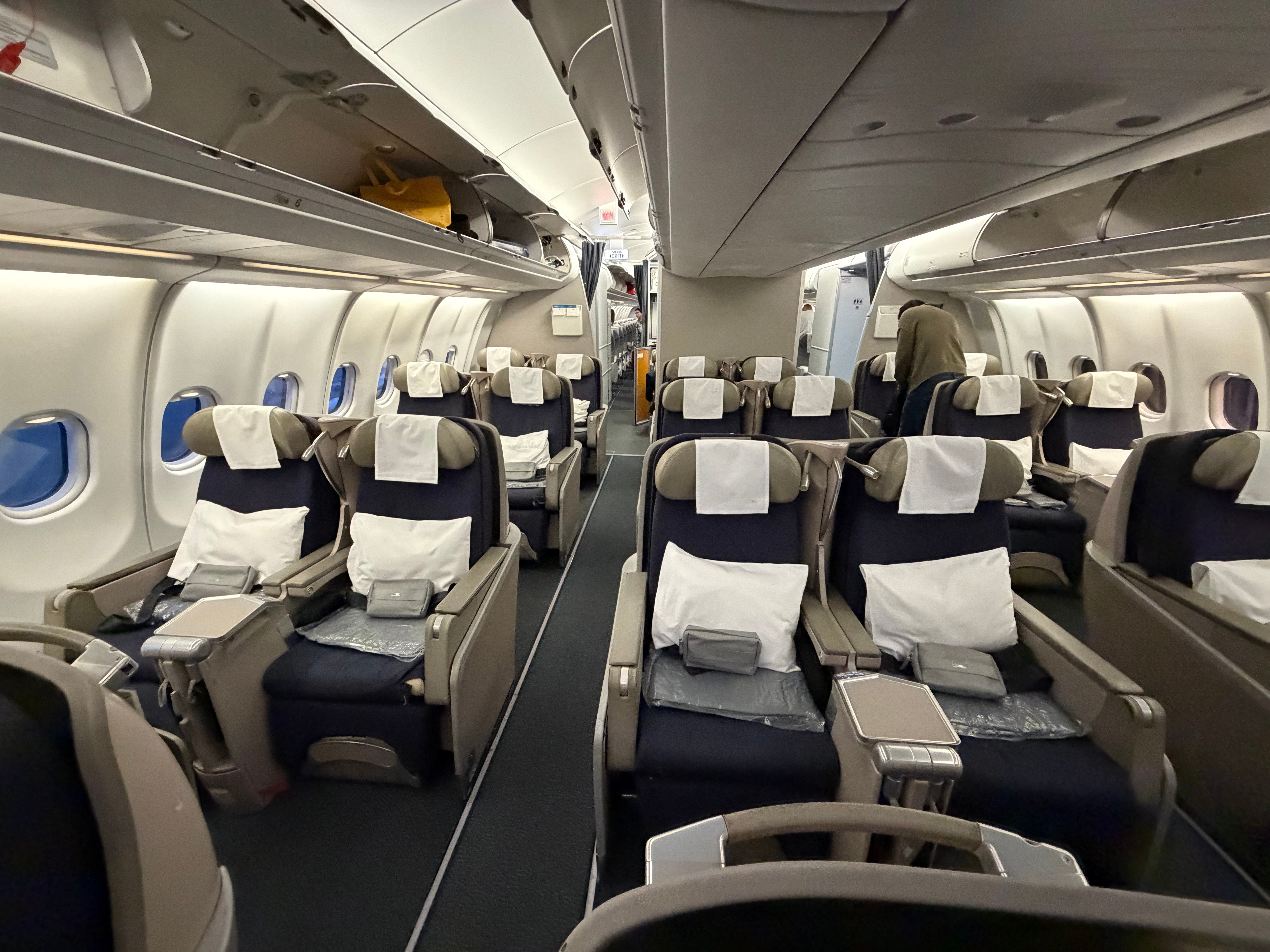 Aisle inside the Aerolíneas Argentinas Airbus A330 Business Class cabin.