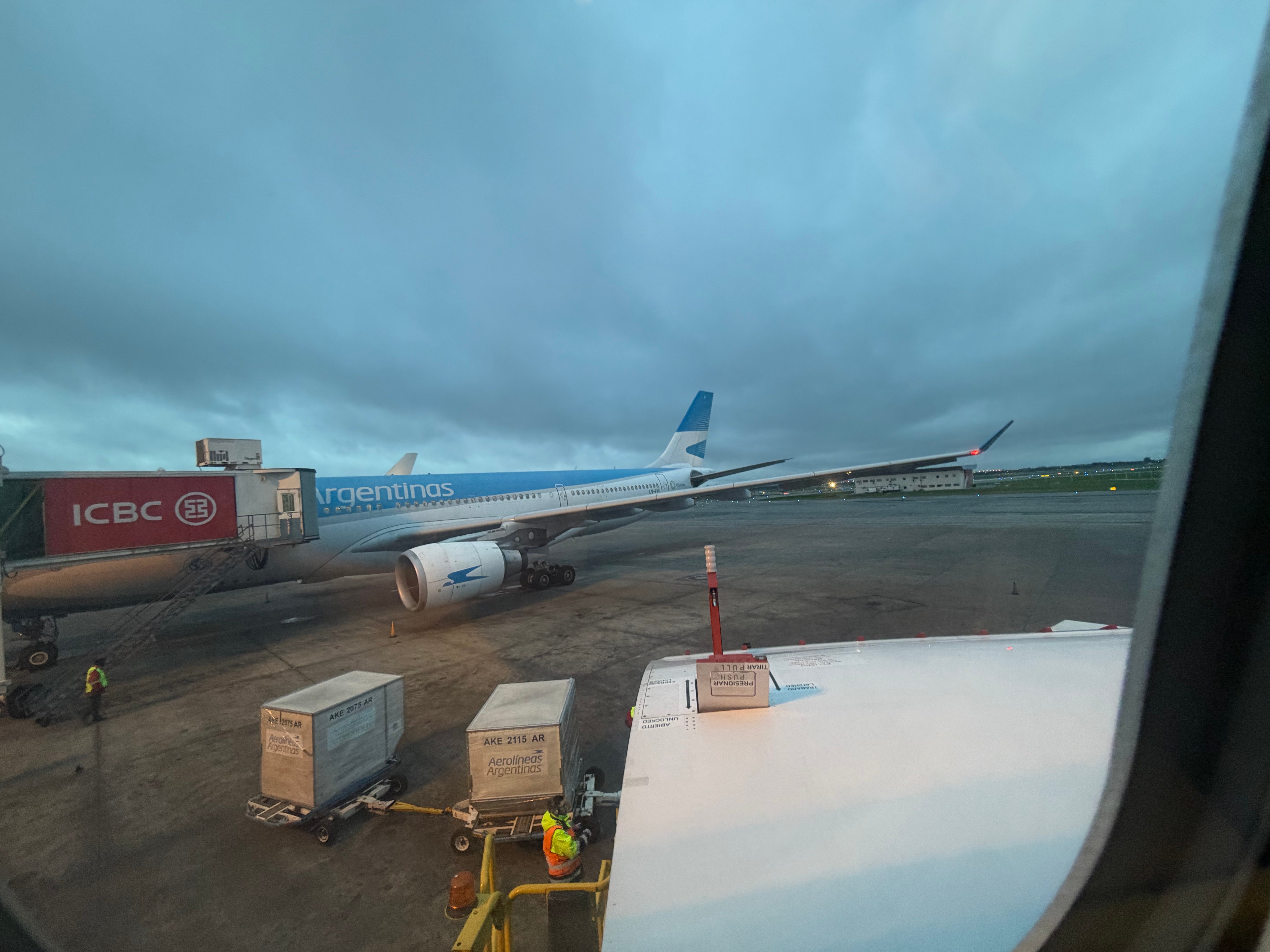 Aerolíneas Argentinas Airbus A330 seen through the cabin window before departure.