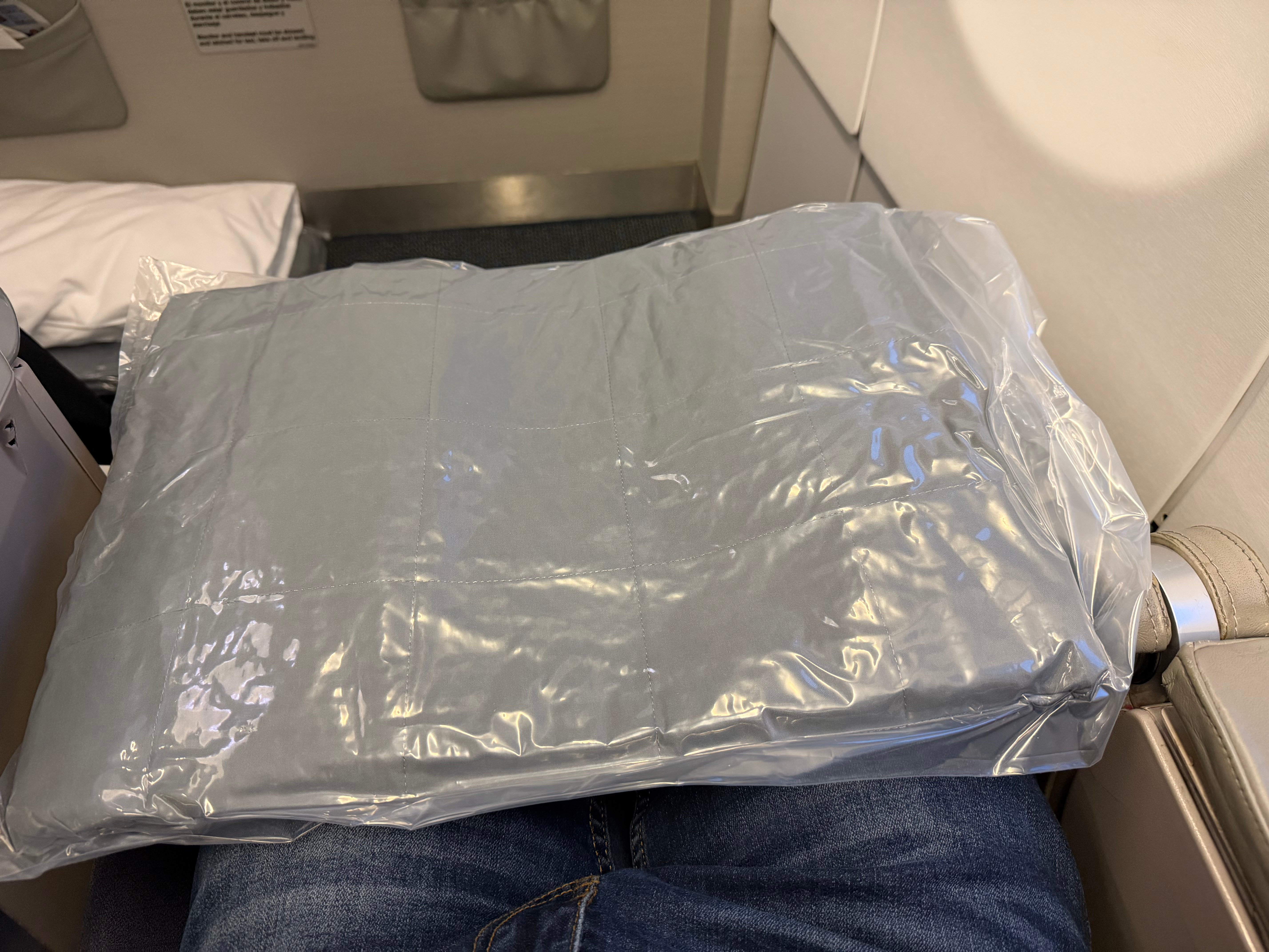 Vacuum sealed blanket provided at the Aerolíneas Argentinas Business Class seat.