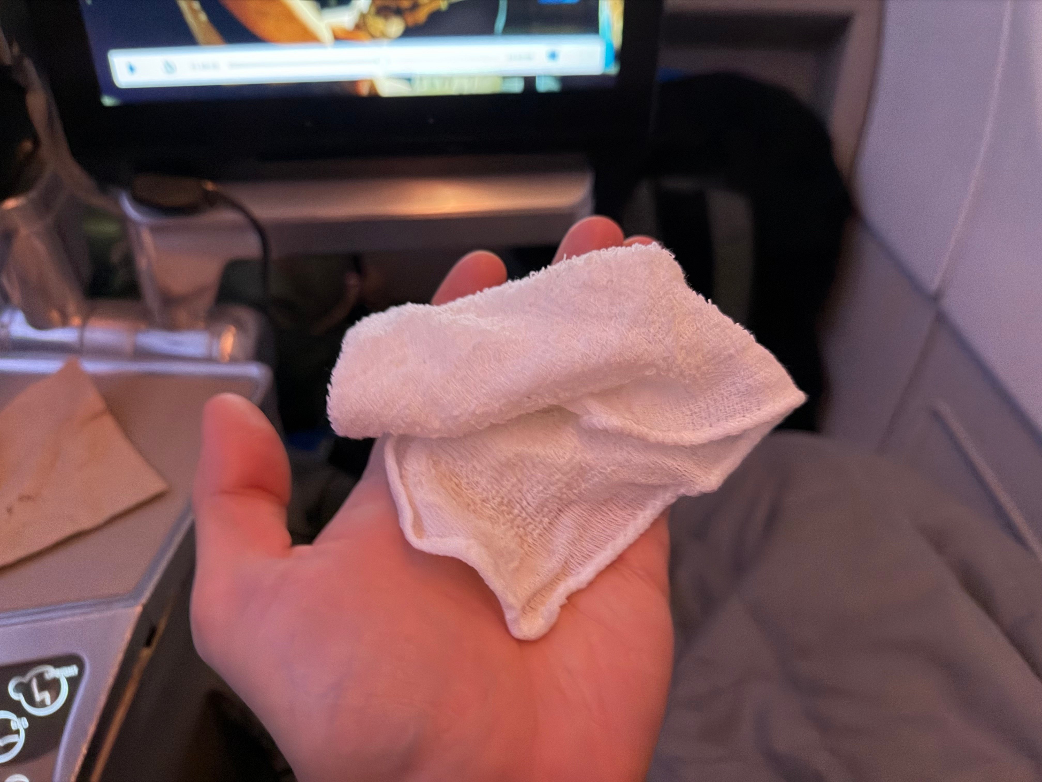 Hot towel provided before lunch in Aerolíneas Argentinas Business Class.