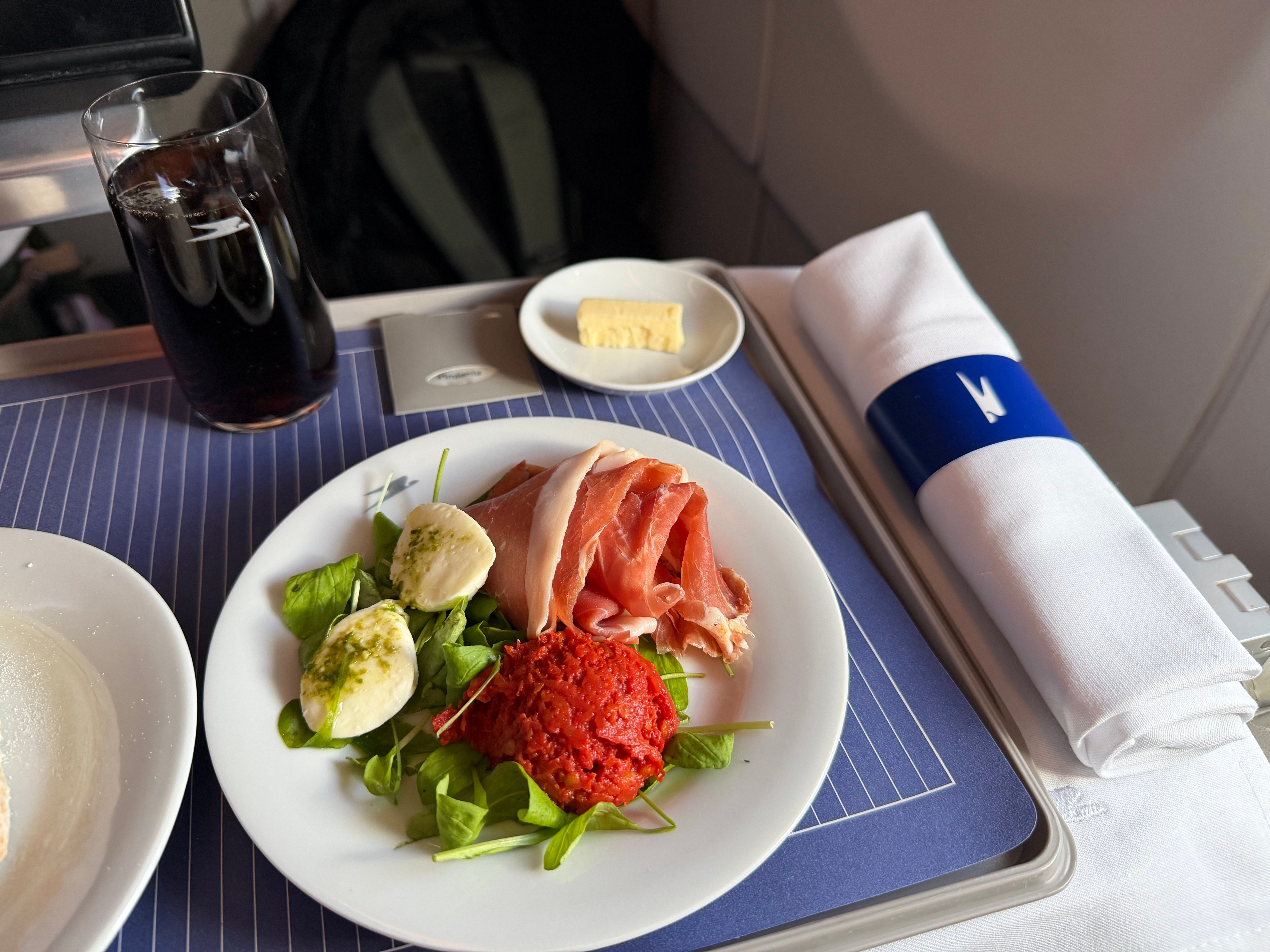 Prosciutto and mozzarella salad served as the Business Class lunch starter.
