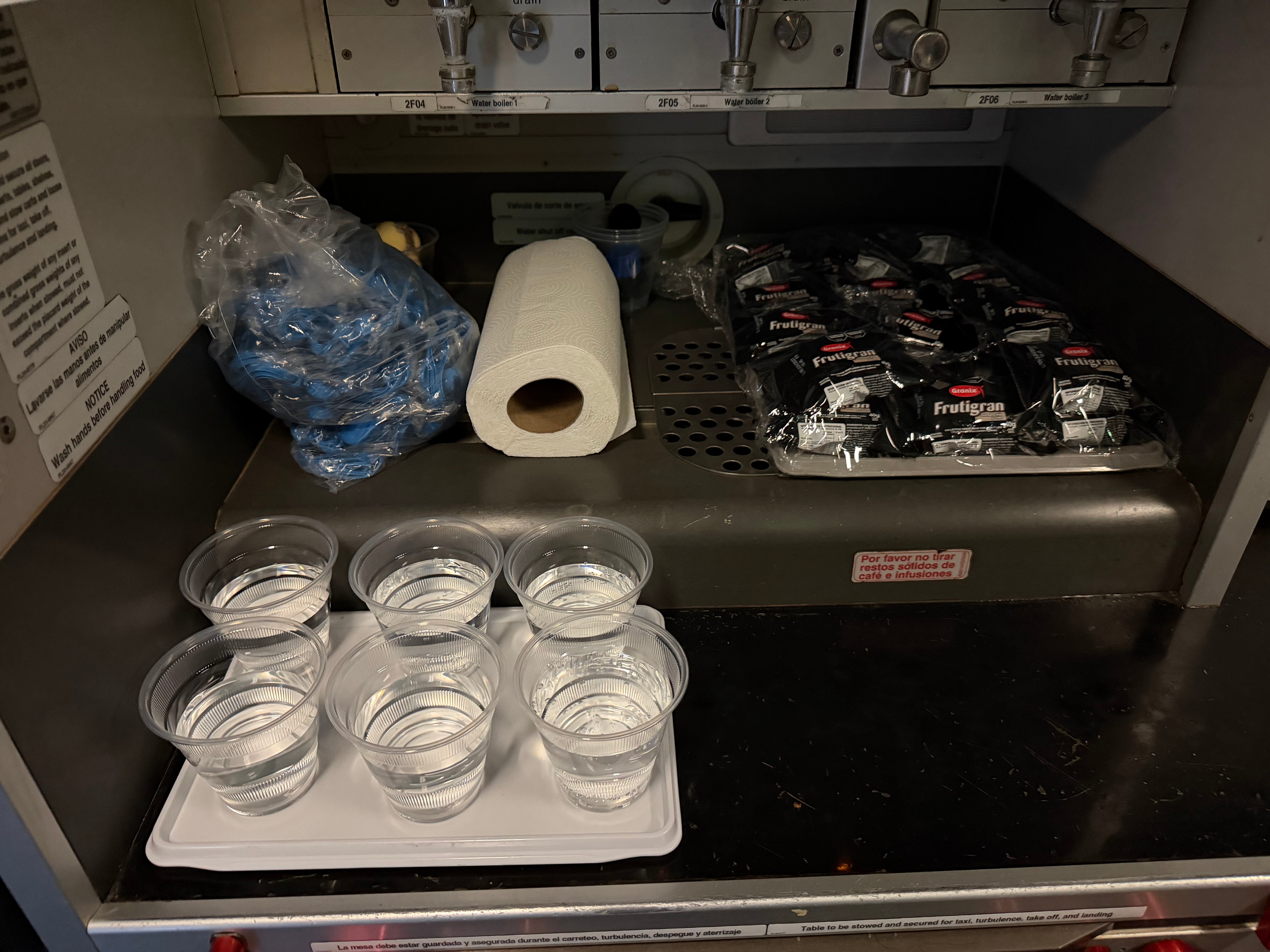 Self service water and snacks in the Aerolíneas Argentinas A330 galley.