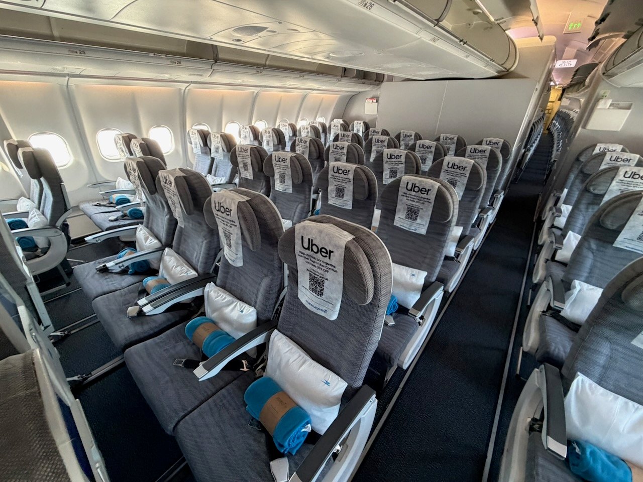 Empty economy seat rows on the Aerolíneas Argentinas A330 before boarding filled up.