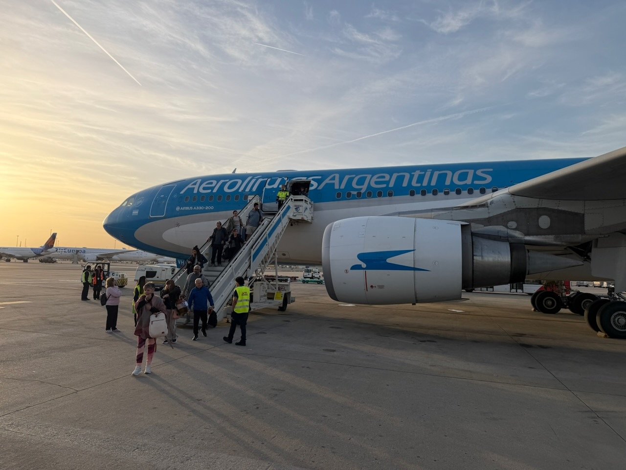 Passengers disembarking from the Aerolíneas Argentinas A330 at a remote stand in Madrid.