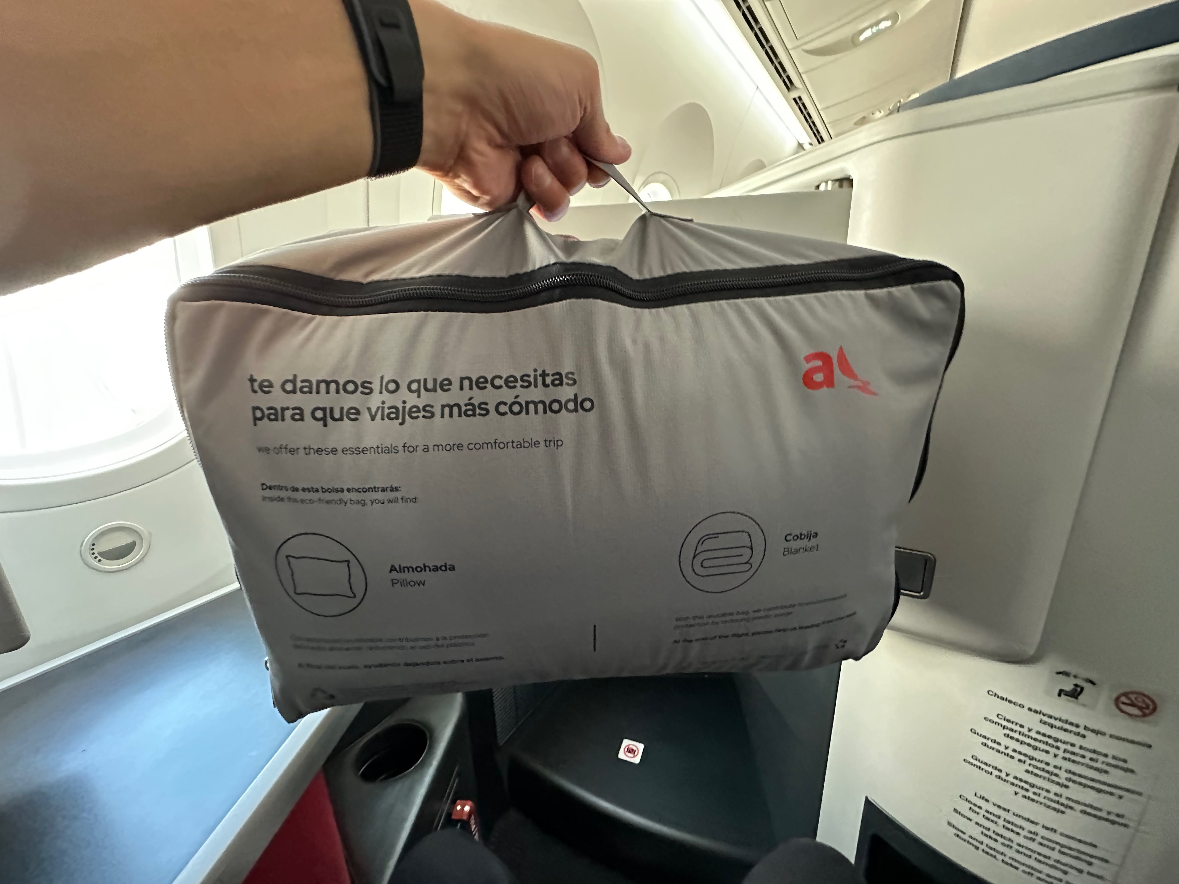 Avianca bag labeled for a pillow and blanket.