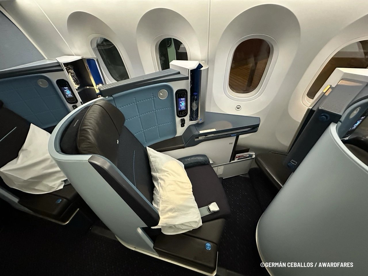 The clean and modern KLM World Business Class cabin.