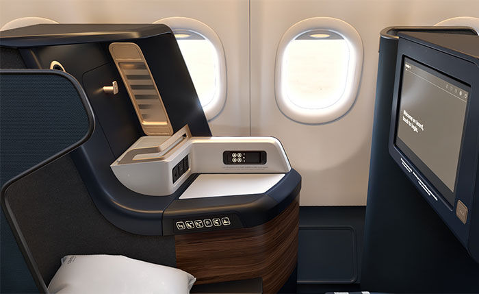Condor A330neo Business Class window seat with a side console, seat controls, and personal screen.