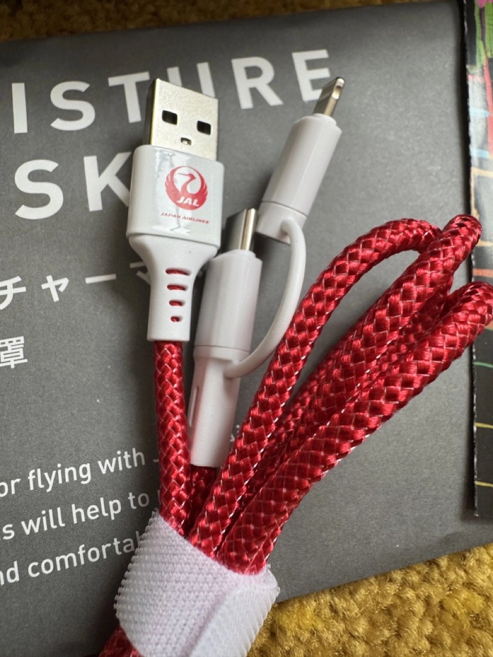 Multi-tip USB-C and Lightning cable included in the amenity kit