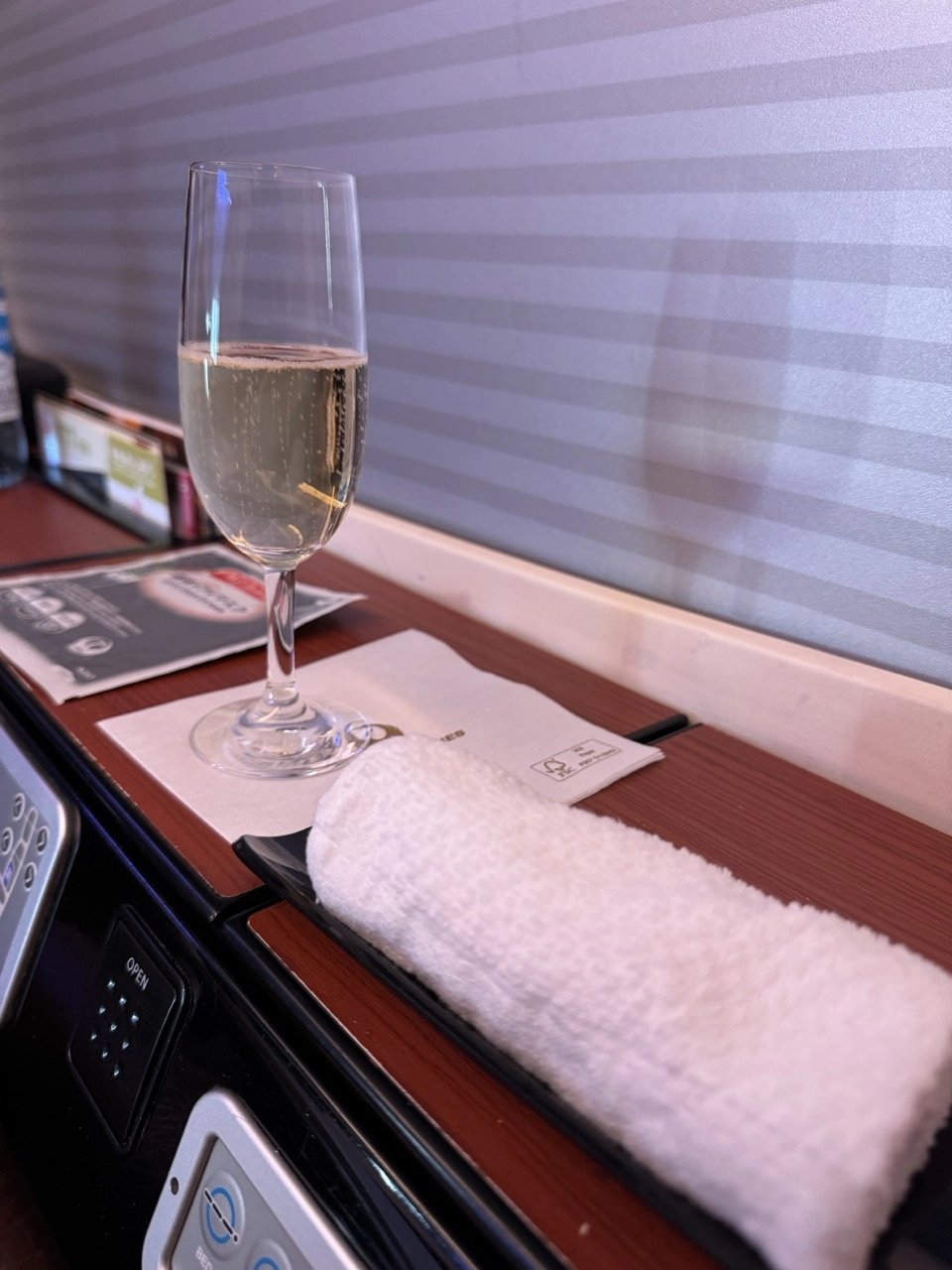 Pre-departure glass of Champagne in JAL First Class