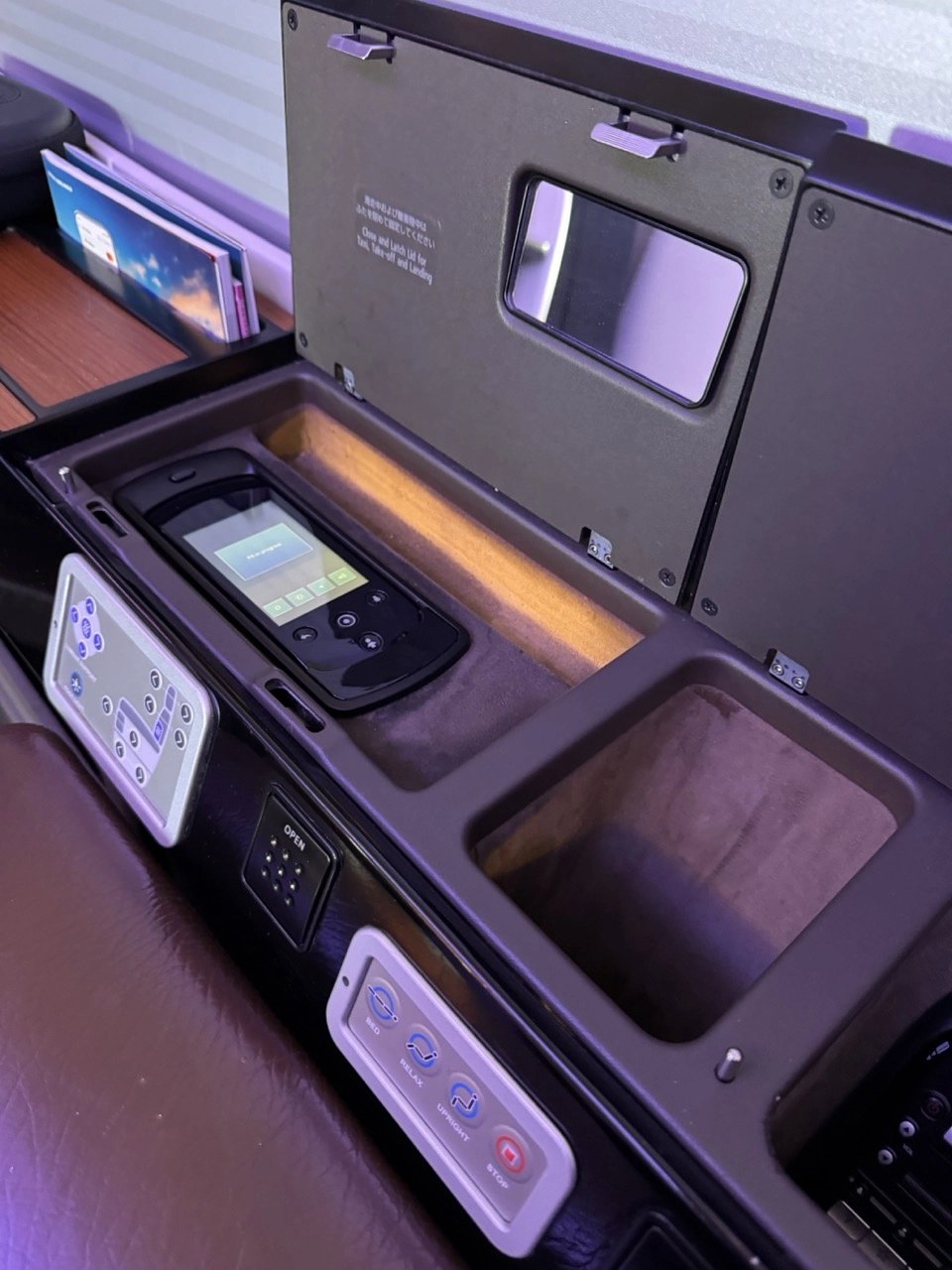 Side storage compartment in JAL First Class seat