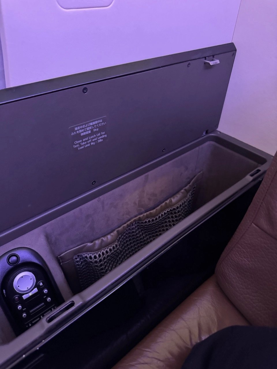 Deeper storage bin next to JAL First Class seat