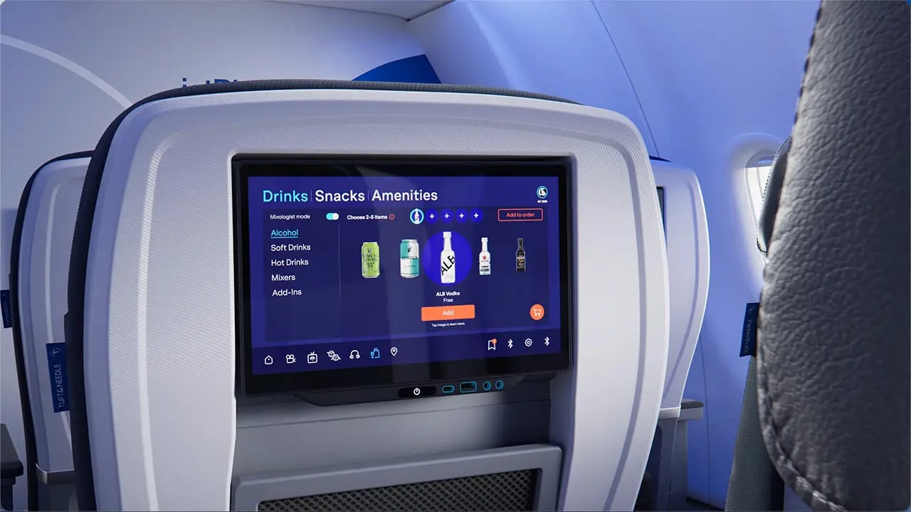 JetBlue BlueFirst seatback screen showing Mixologist Mode for ordering a custom drink.