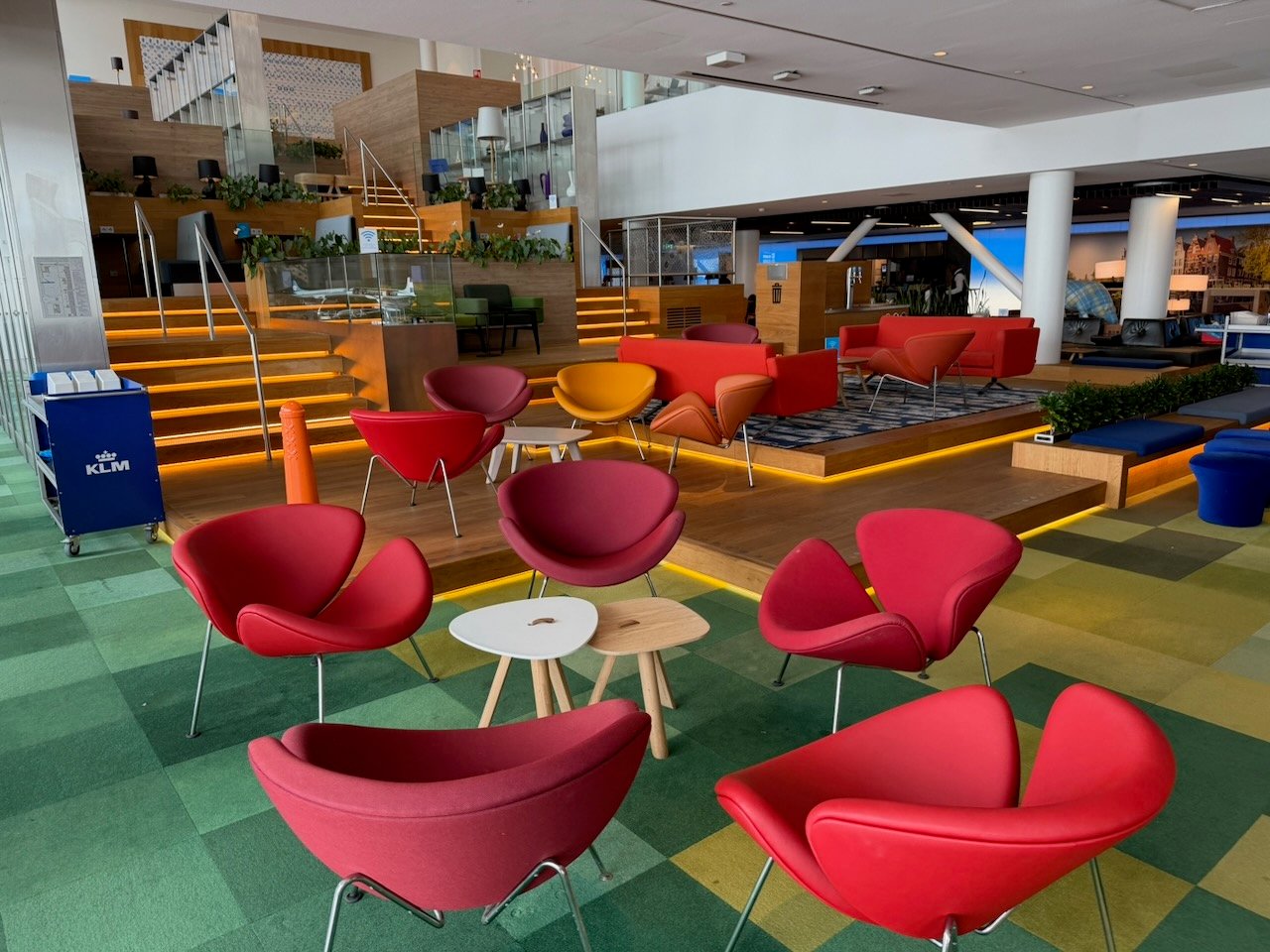 Amsterdam KLM crown lounge colorful seating on the KLM Amsterdam to Buenos Aires review.