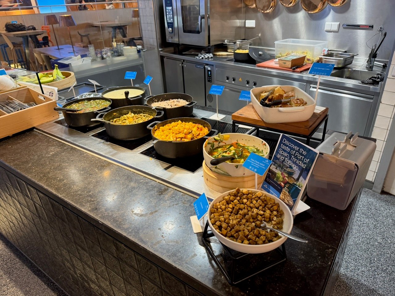 Amsterdam KLM crown lounge hot food counter on the KLM Amsterdam to Buenos Aires review.
