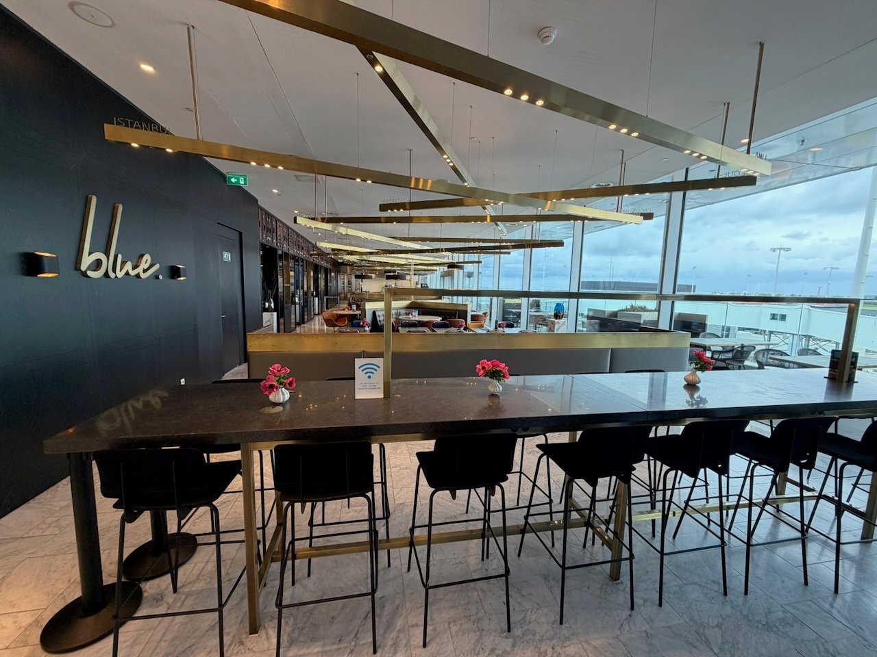 Amsterdam KLM crown lounge blue bar on the KLM Amsterdam to Buenos Aires review.