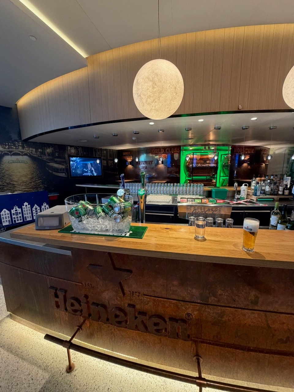 Amsterdam KLM crown lounge blue bar counter on the KLM Amsterdam to Buenos Aires review.