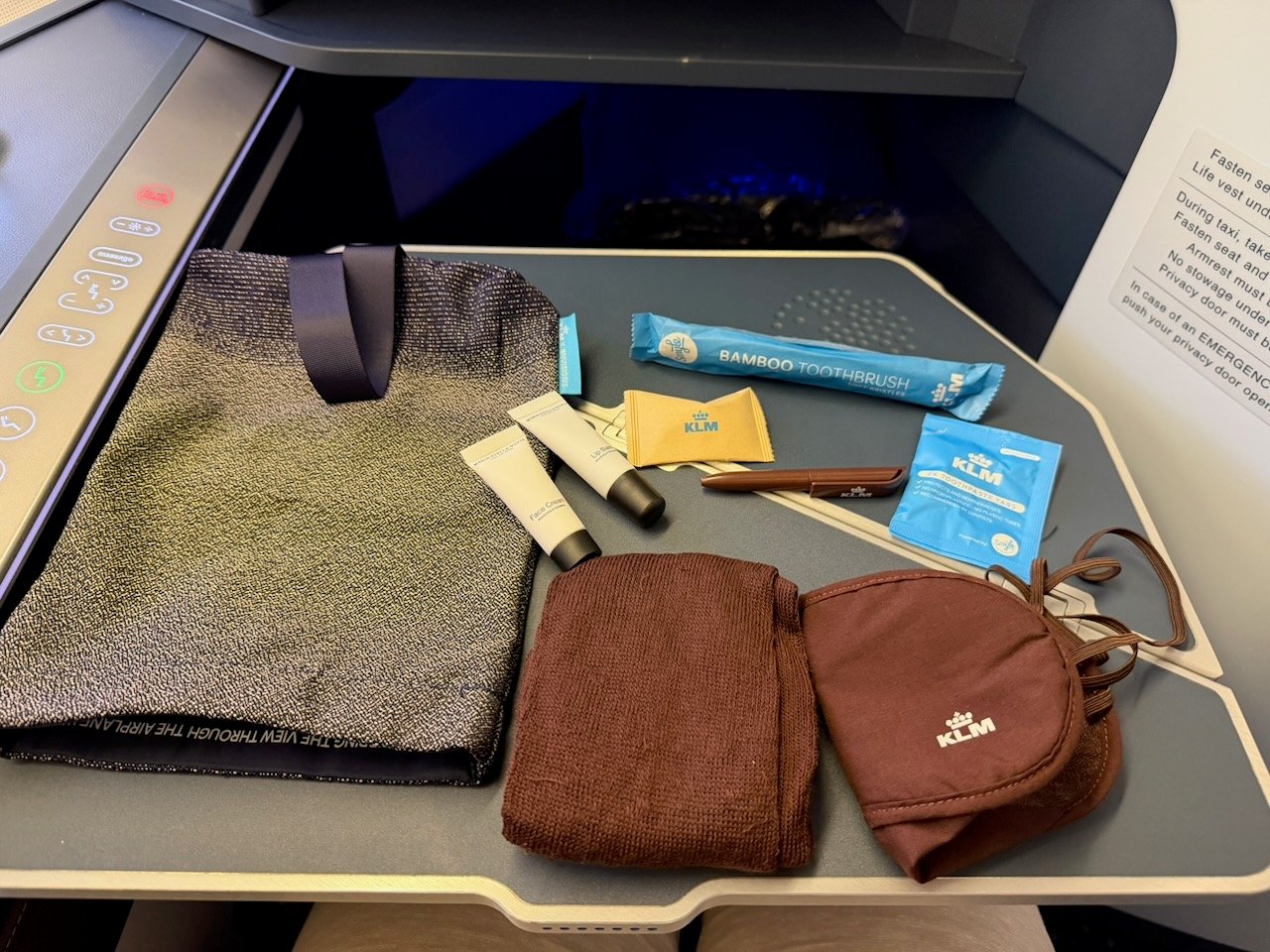 KLM AMS EZE amenity kit and headphones on the KLM Amsterdam to Buenos Aires review.