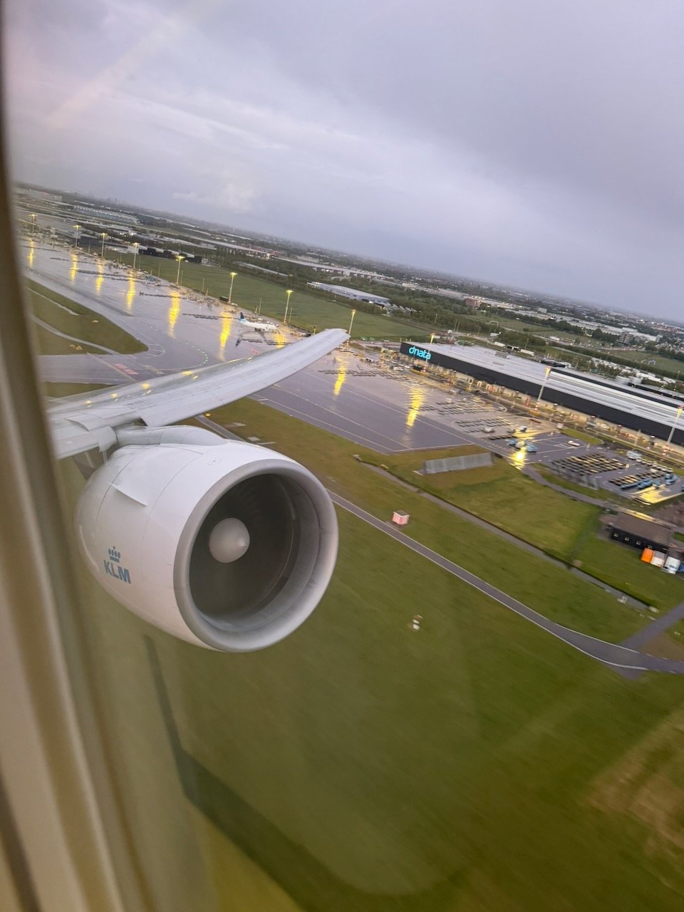 KLM AMS EZE takeoff roll wing view on the KLM Amsterdam to Buenos Aires review.