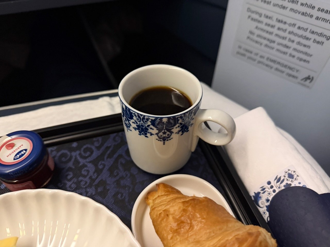 KLM AMS EZE coffee and croissant on the KLM Amsterdam to Buenos Aires review.