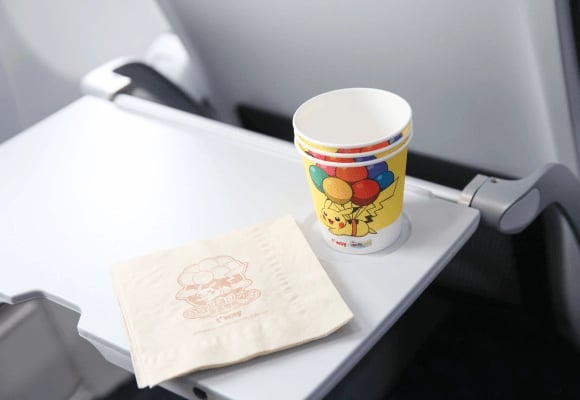 Pokémon-themed in-flight items and aprons.