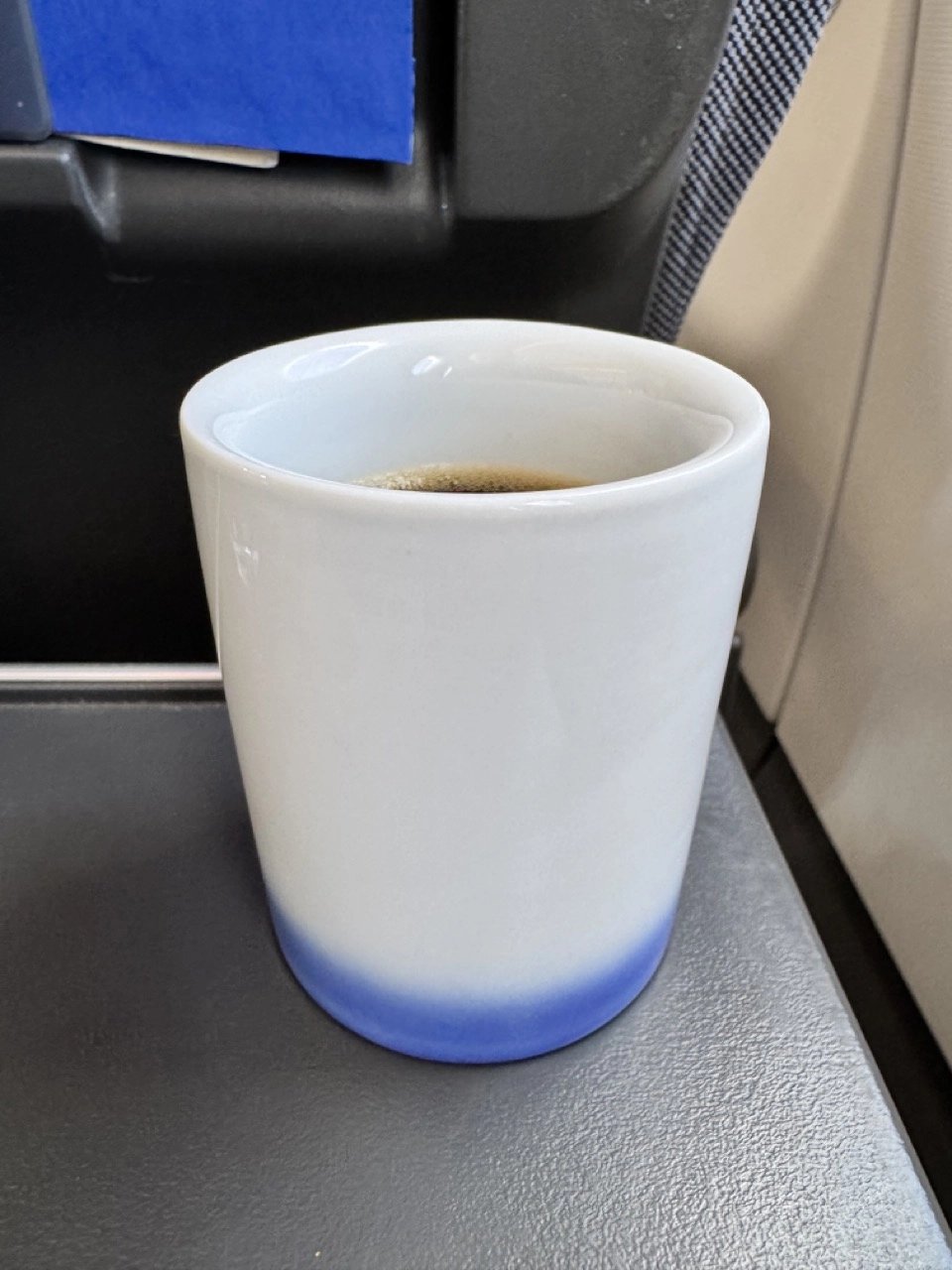 A specially designed thermos coffee mug.
