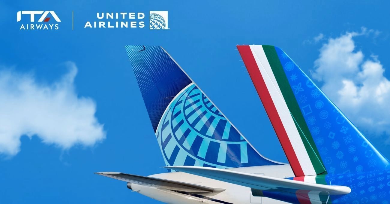 The tail fins of an ITA Airways and a United Airlines airplane side-by-side.