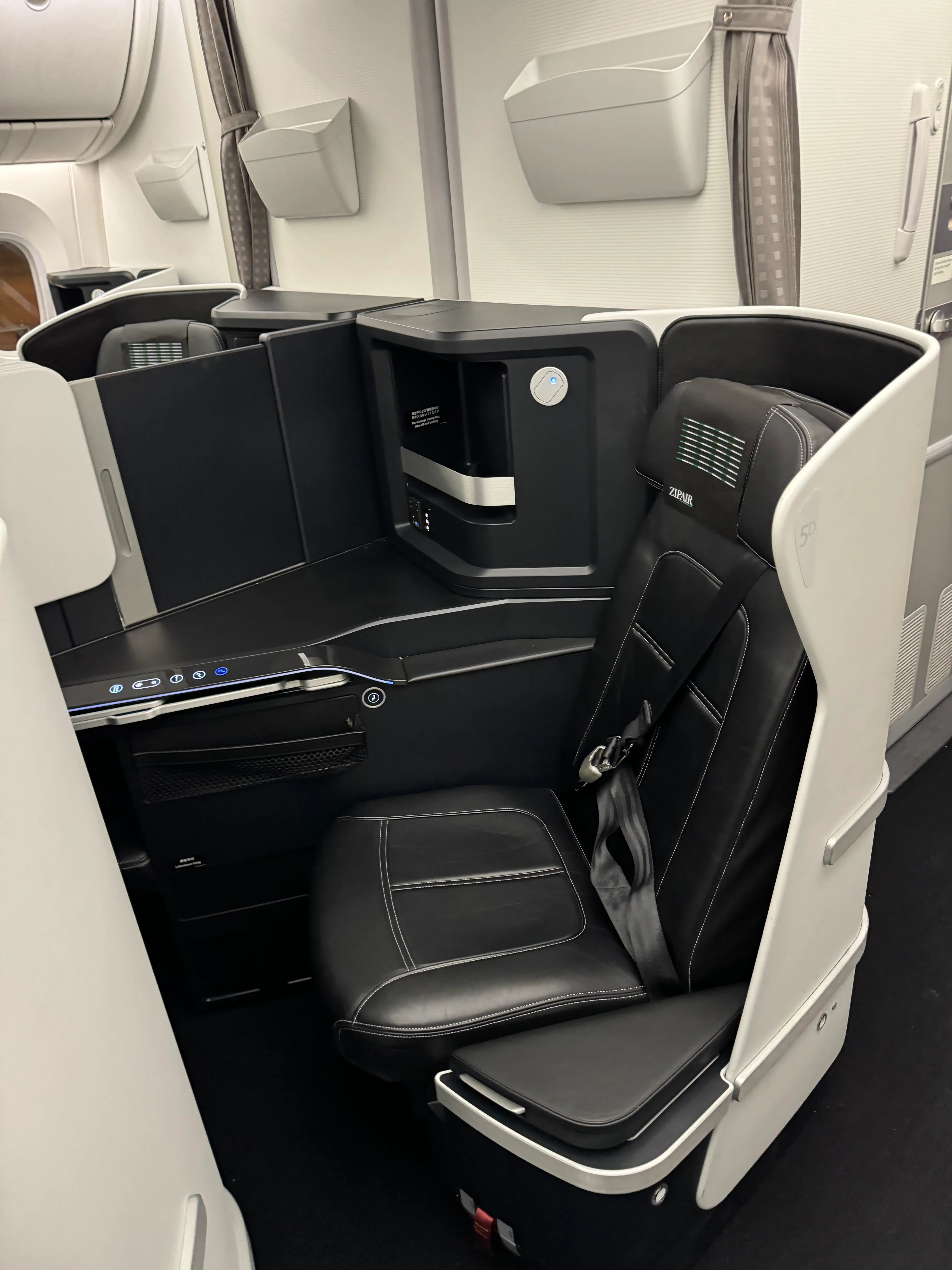View of the ZIPAIR Full-Flat cabin from the aisle.